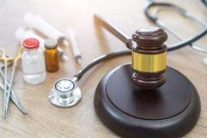 gavel-stethoscope-medical-jurisprudence-legal-definition_35048-1684